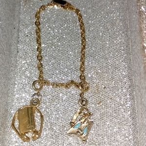 Vintage gold guitar and headphones charm bracelet